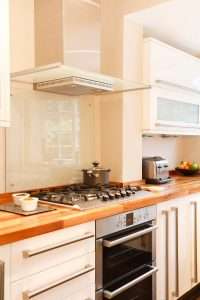 clear glass splashback