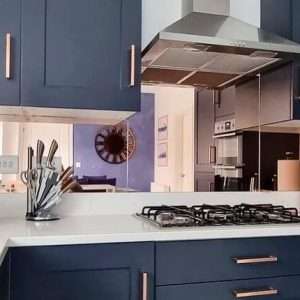 copper mirror splashback